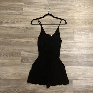 Black H&M Romper with pockets. Size 02